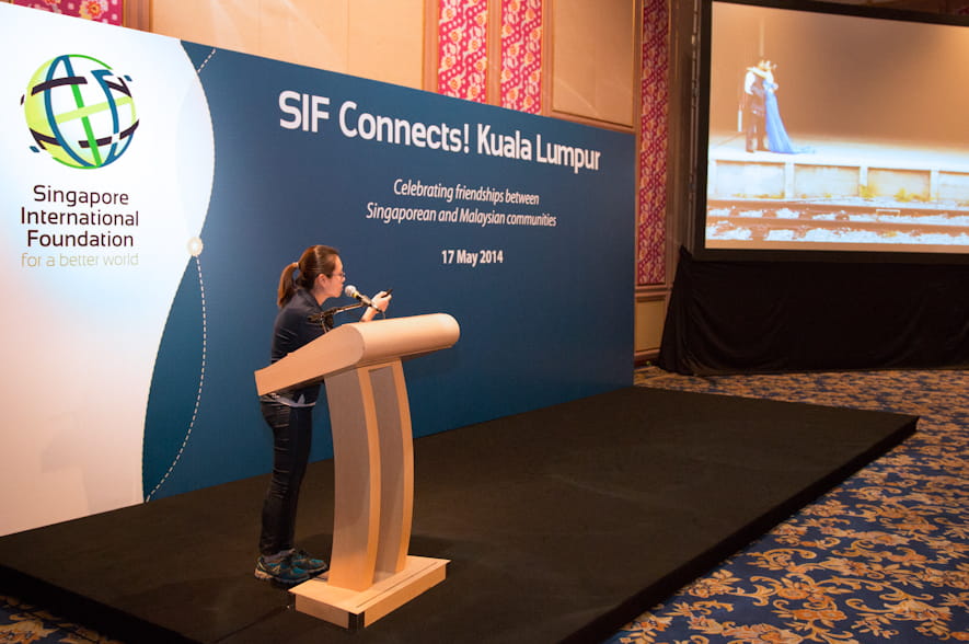 SI photojournalist Zann Huang speaking about connectivity by rail and connections between Singapore and Malaysia with her photo-story on the Tanjong Pagar Railway Station.